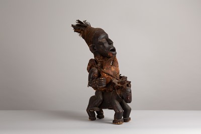 Lot 106 - A carved wood figure