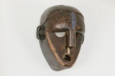 Lot 241 - A carved mask