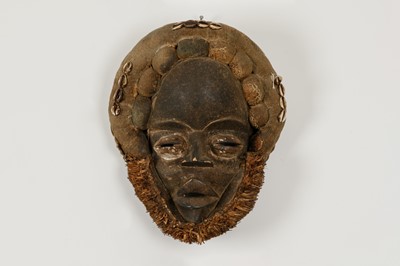 Lot 429 - A carved mask