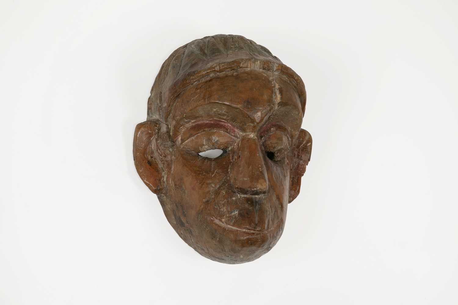 Lot 240 - A carved and painted wood mask