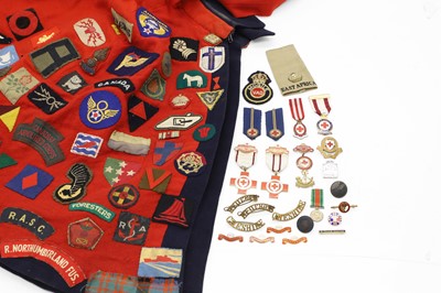 Lot 227 - A World War Two Voluntary Aid Detachment nurse's cape