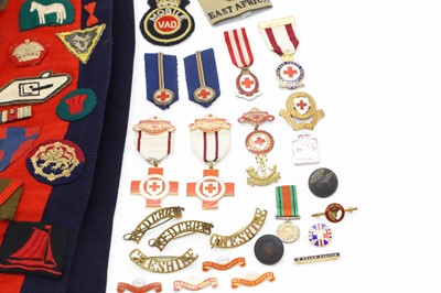 Lot 227 - A World War Two Voluntary Aid Detachment nurse's cape