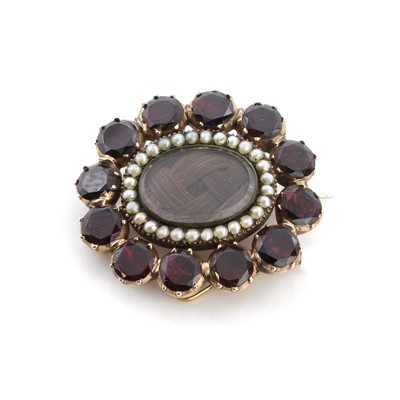 Lot 4 - A Georgian split pearl and garnet memorial brooch