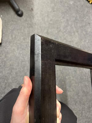 Lot 563 - A pair of ebony and specimen stone frames