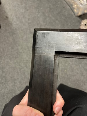 Lot 563 - A pair of ebony and specimen stone frames