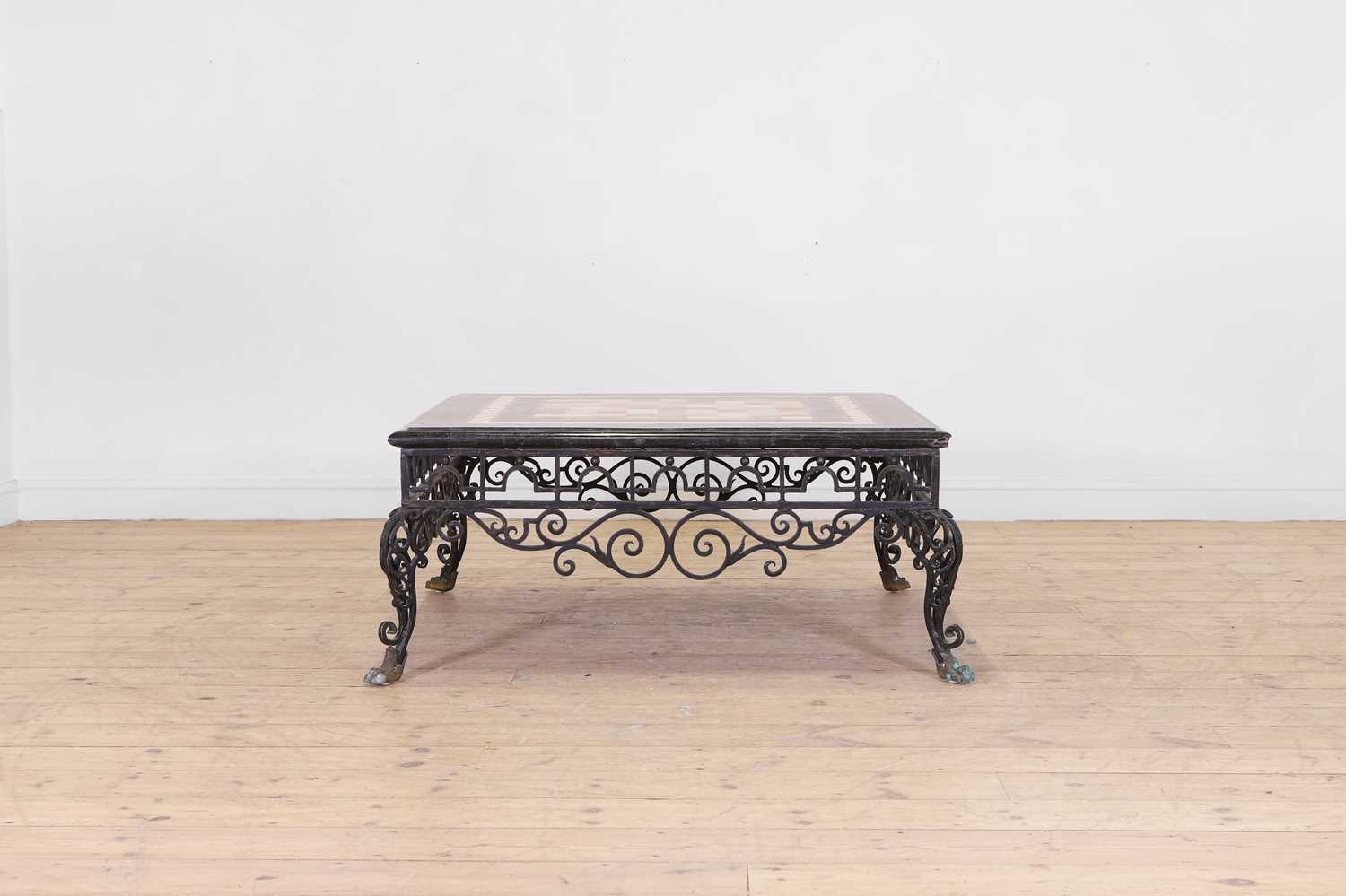 Lot 21 - A specimen marble-topped coffee table