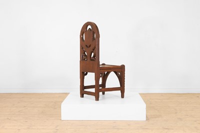 Lot 518 - A Victorian Gothic Revival oak hall chair