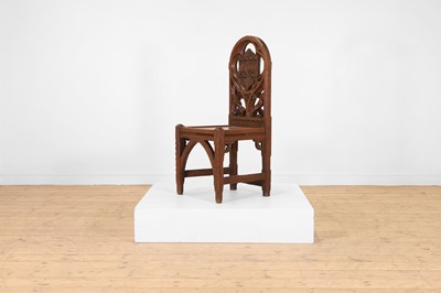 Lot 518 - A Victorian Gothic Revival oak hall chair