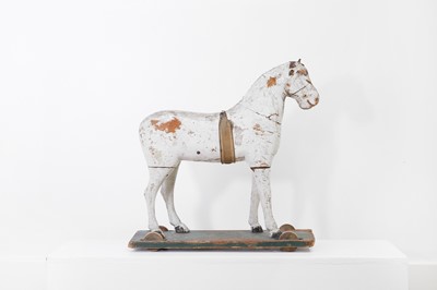 Lot 161 - A painted wooden horse