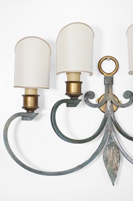 Lot 476 - A pair of toleware and parcel-gilt wall lights