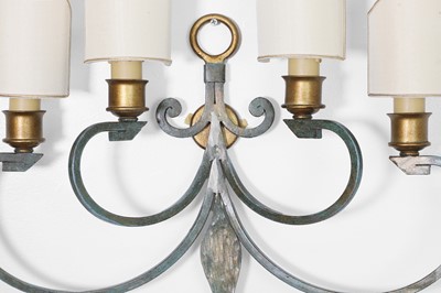 Lot 476 - A pair of toleware and parcel-gilt wall lights