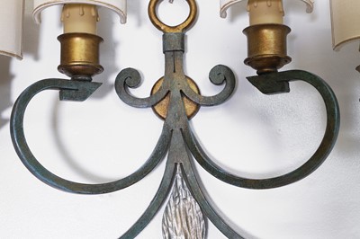 Lot 476 - A pair of toleware and parcel-gilt wall lights