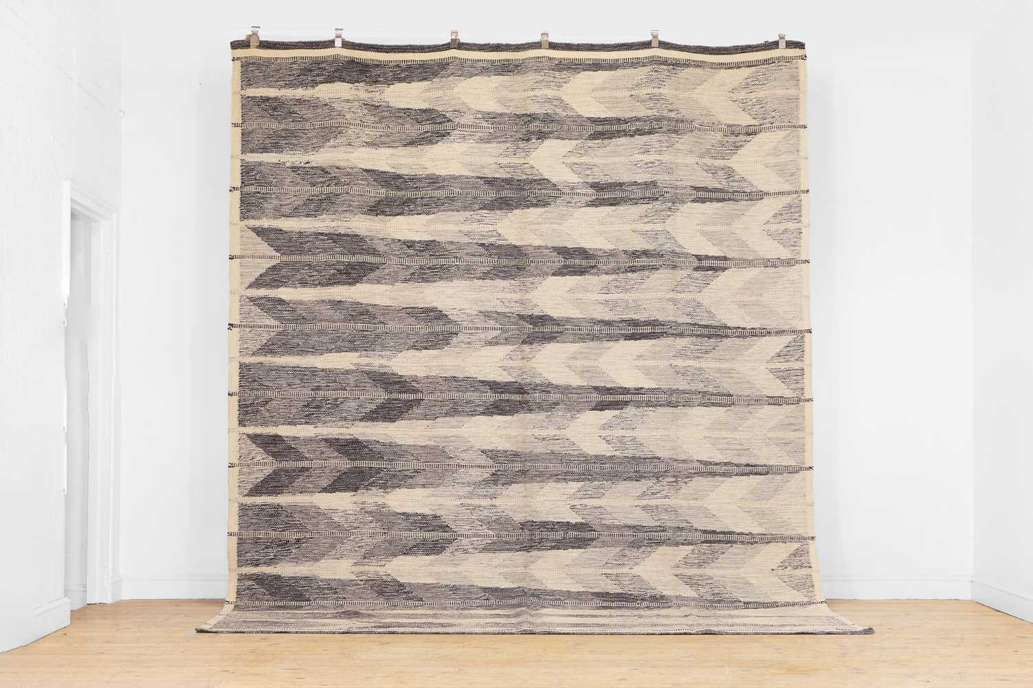 Lot 12 - A flat-weave kilim rug