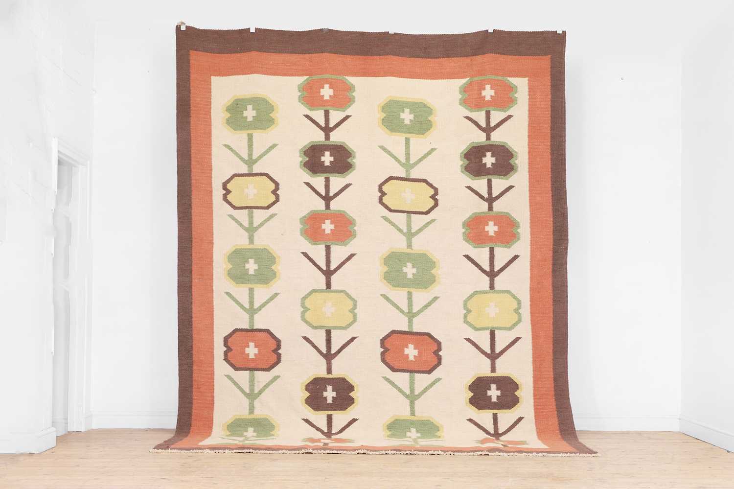 Lot 83 - A Colefax & Fowler-inspired flat-weave wool rug