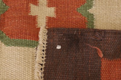 Lot 83 - A Colefax & Fowler-inspired flat-weave wool rug