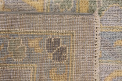 Lot 51 - A large Oushak wool carpet