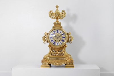 Lot 368 - A Louis XIV-style gilt-bronze mantel clock