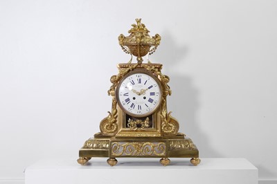 Lot 78 - A Louis XV-style ormolu mantel clock