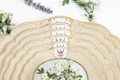Lot 52 - A set of Victorian graduated porcelain armorial plates