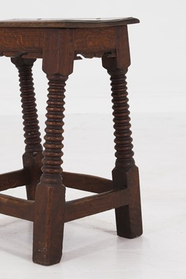 Lot 39 - A carved oak joint stool