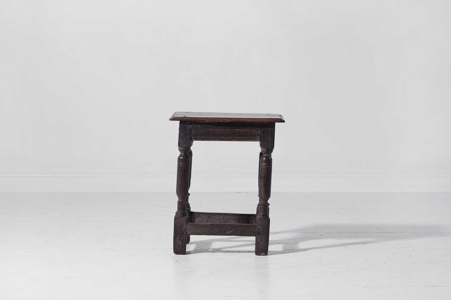 Lot 5 - An oak joint stool