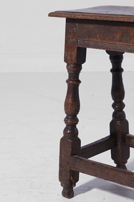 Lot 25 - An oak joint stool