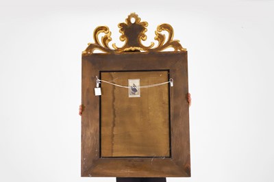 Lot 1 - A baroque-style walnut and parcel-gilt pier mirror