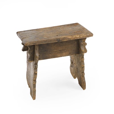 Lot 376 - An oak bench end stool