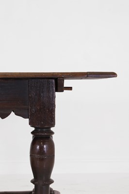 Lot 11 - An oak refectory table