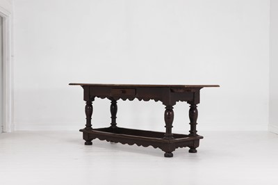 Lot 11 - An oak refectory table