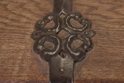Lot 12 - An iron-bound oak chest