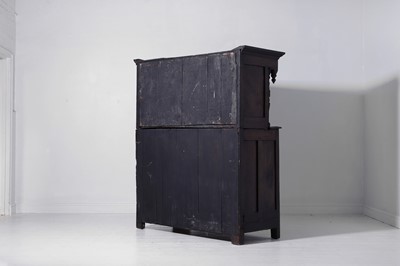 Lot 13 - A carved oak court cupboard