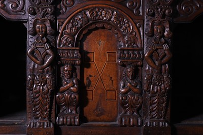 Lot 13 - A carved oak court cupboard