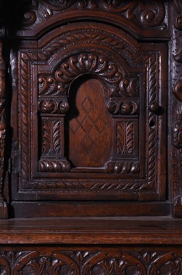 Lot 13 - A carved oak court cupboard
