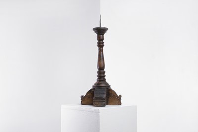 Lot 18 - A walnut pricket candlestick