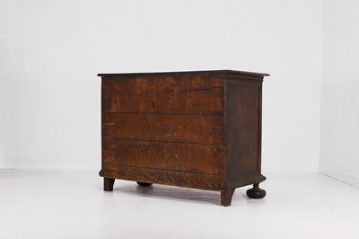 Lot 36 - A large baroque walnut commode or cassettone