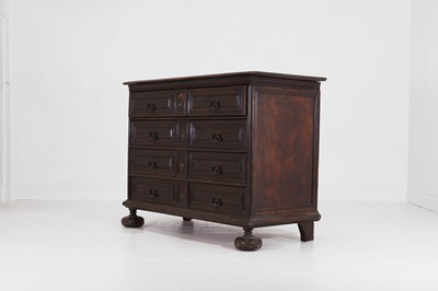Lot 36 - A large baroque walnut commode or cassettone