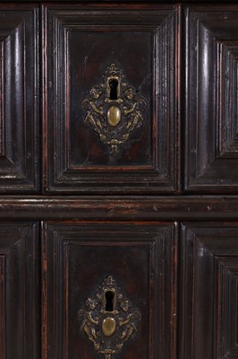 Lot 36 - A large baroque walnut commode or cassettone