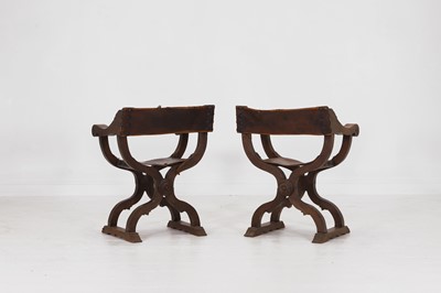 Lot 2 - A pair of Renaissance-style carved walnut Savonarola chairs