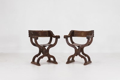 Lot 2 - A pair of Renaissance-style carved walnut Savonarola chairs