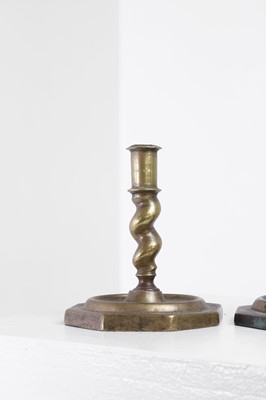 Lot 21 - A near pair of brass candlesticks