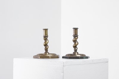 Lot 21 - A near pair of brass candlesticks