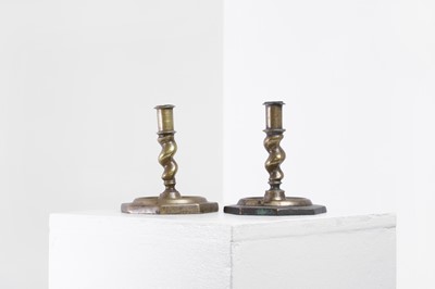 Lot 21 - A near pair of brass candlesticks