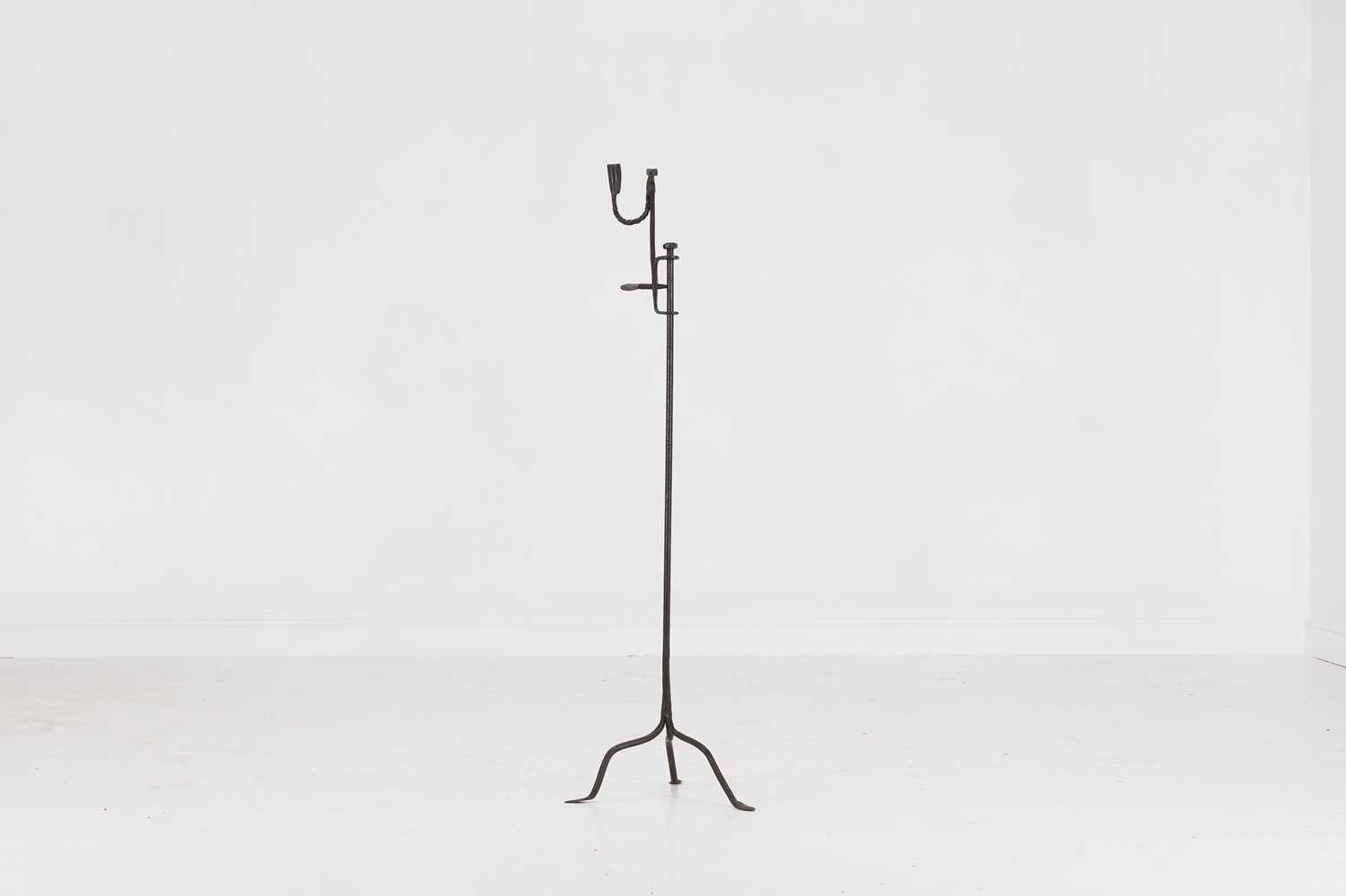 Lot 6 - A wrought-iron floor-standing rush light