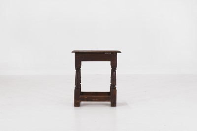 Lot 28 - An oak joint stool