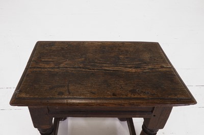 Lot 28 - An oak joint stool