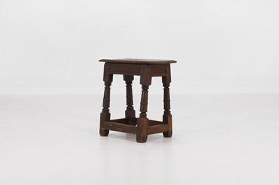 Lot 28 - An oak joint stool