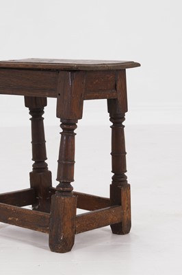 Lot 28 - An oak joint stool
