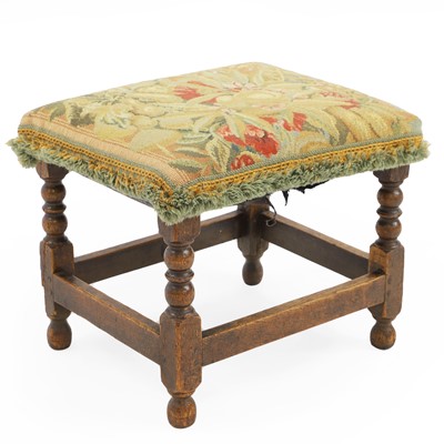 Lot 379 - An oak framed stool