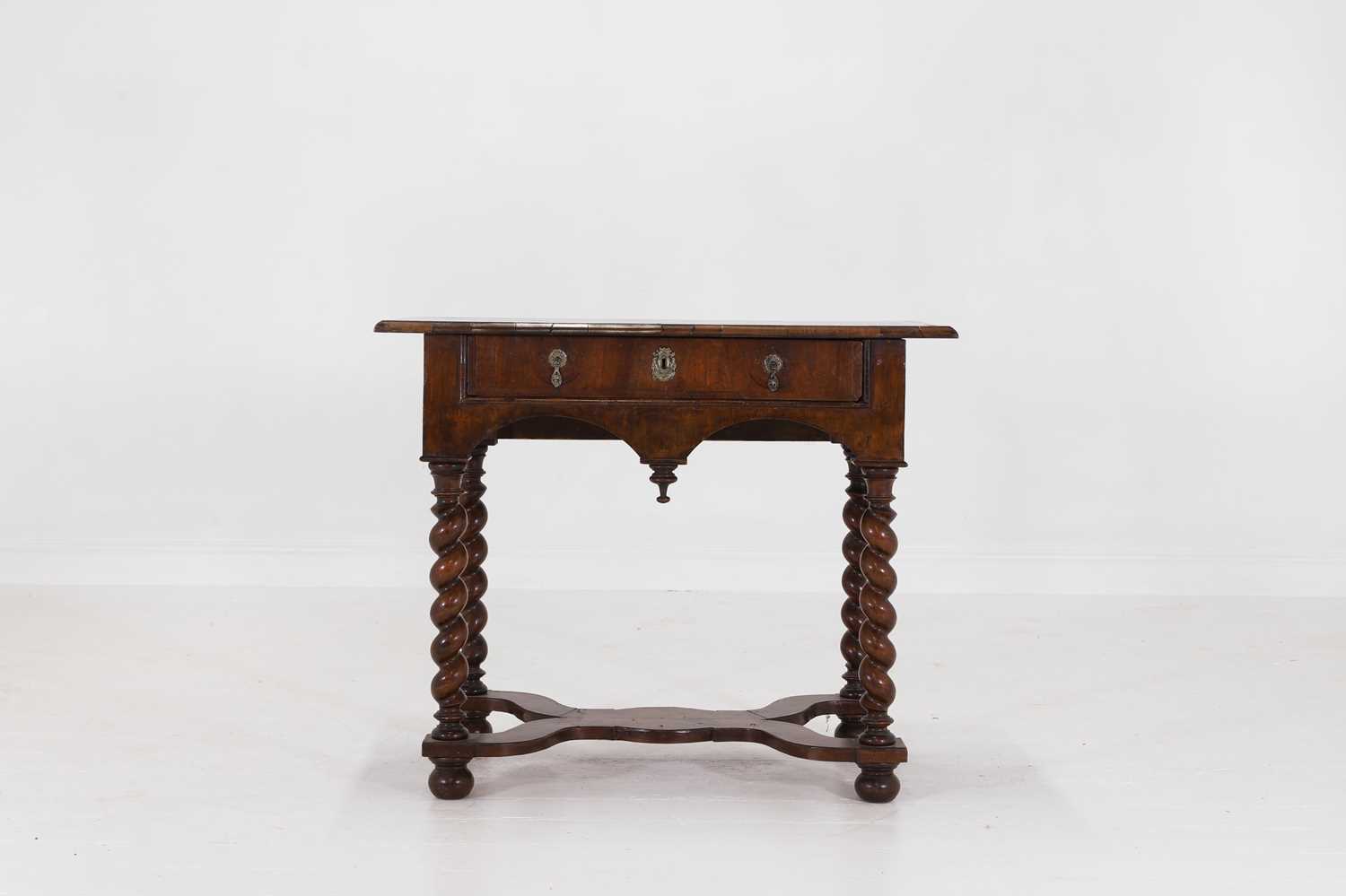 Lot 41 - A walnut side table